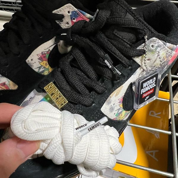 Nike x supreme sales world famous shoes